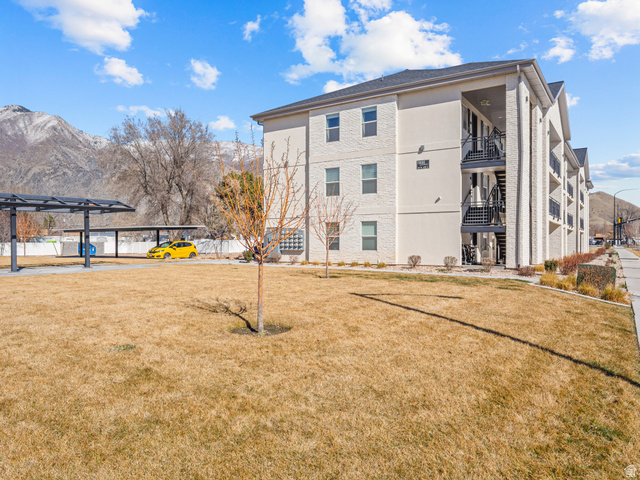 64 West 600 South, Unit C301 Springville, UT 84663 - Photo 36 of 40 View of apartment building / complex with a mountain view and stairway