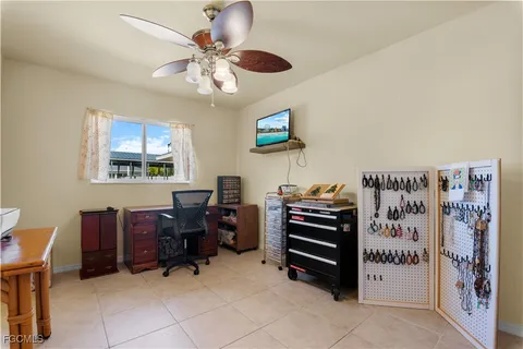 a view of a workspace with furniture