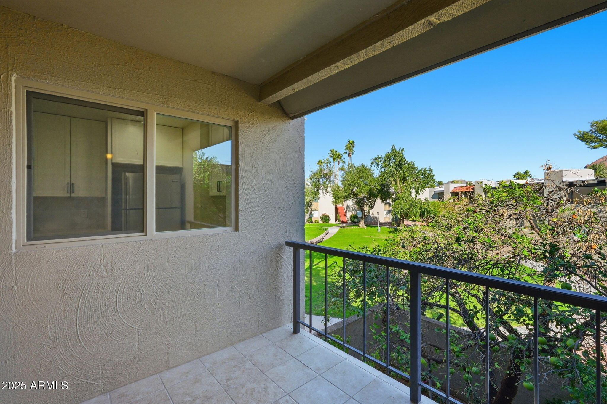 4201 East Camelback Road, Unit 74 Phoenix, AZ 85018 - Photo 19 of 20 a view of a balcony