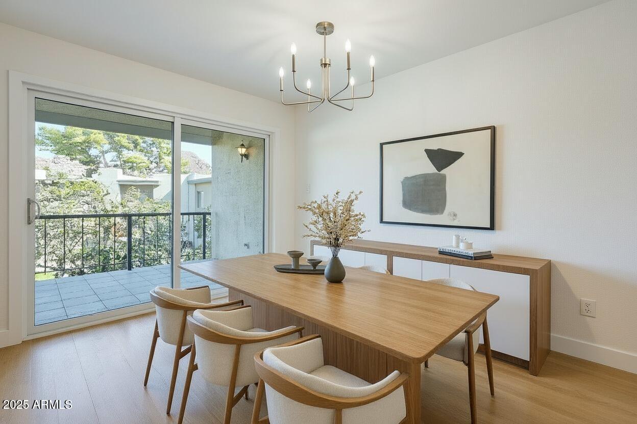 4201 East Camelback Road, Unit 74 Phoenix, AZ 85018 - Photo 4 of 20 a dining room with furniture and window
