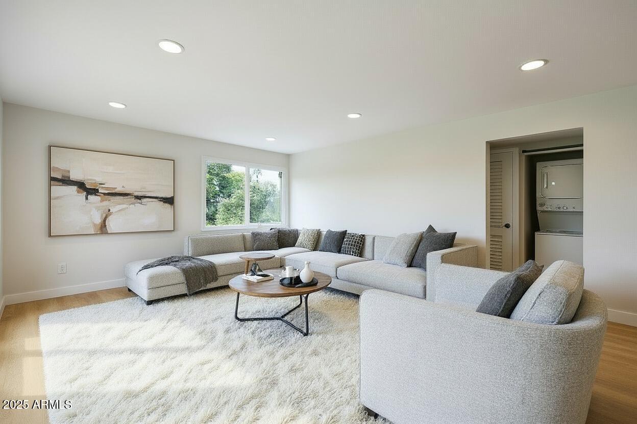 4201 East Camelback Road, Unit 74 Phoenix, AZ 85018 - Photo 6 of 20 a living room with furniture