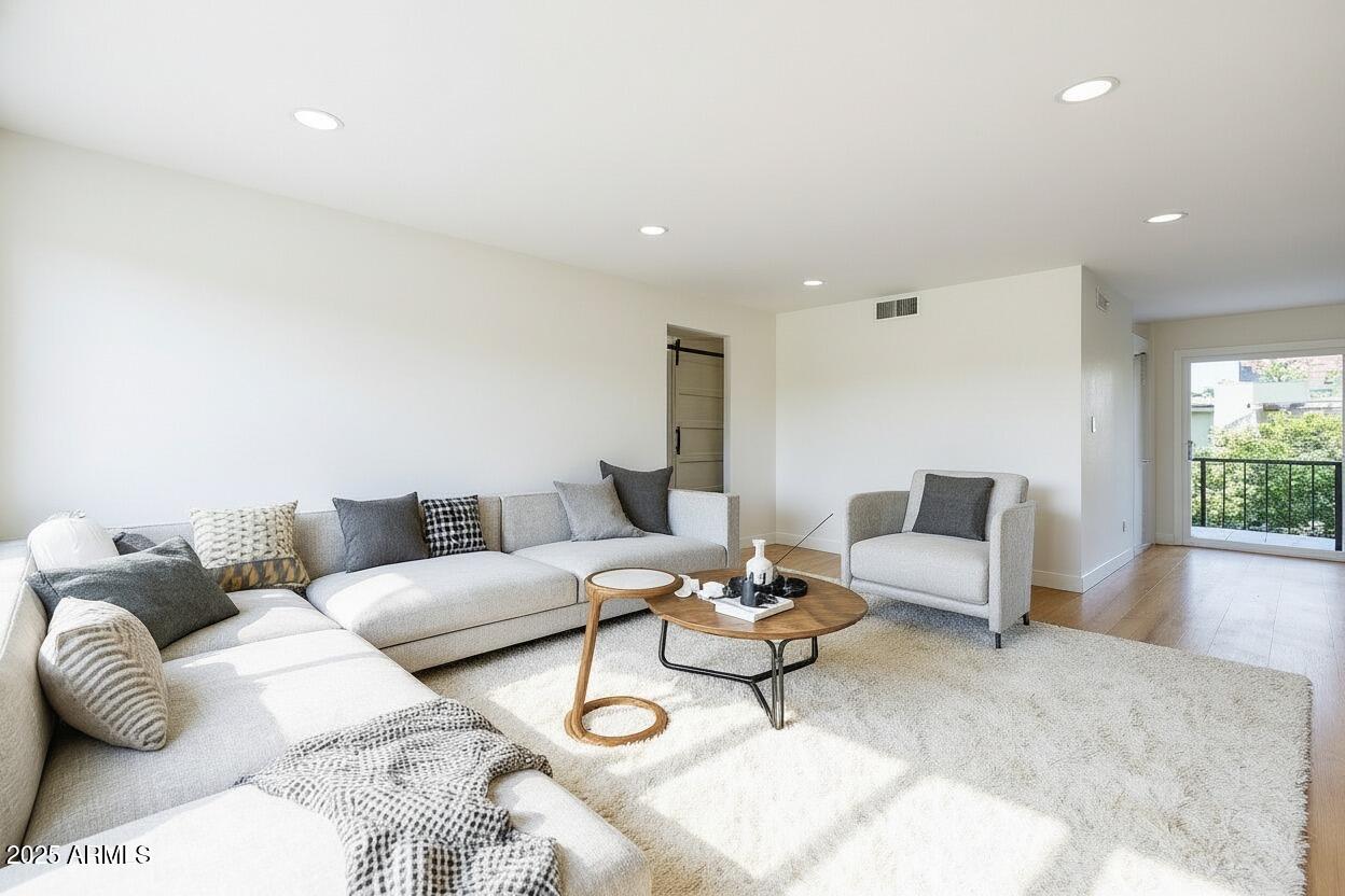 4201 East Camelback Road, Unit 74 Phoenix, AZ 85018 - Photo 7 of 20 a living room with furniture