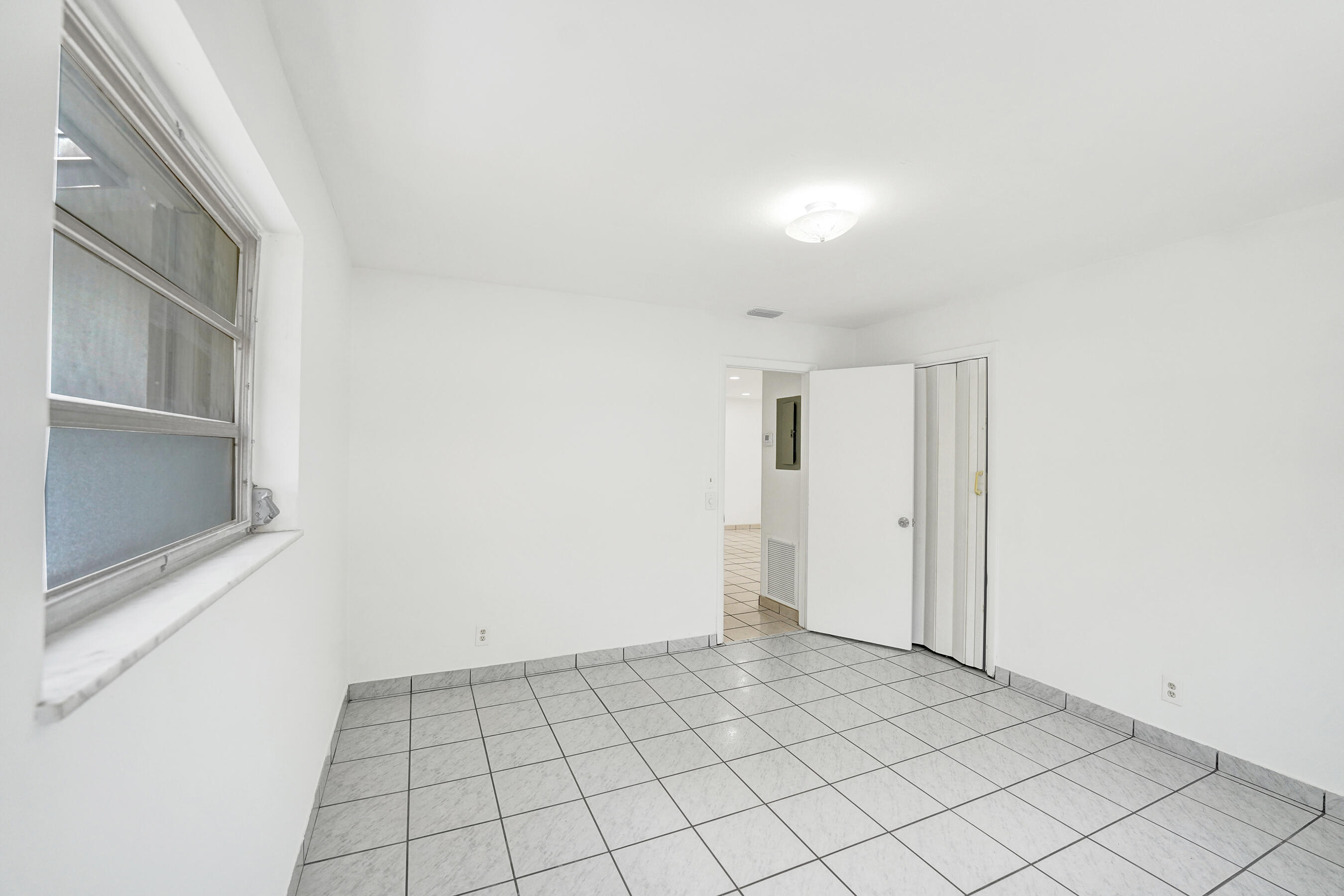 5830 Garfield Street Hollywood, FL 33021 - Photo 11 of 54 Unit 1 Primary Bedroom