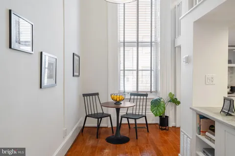 a closeup of a sink with a potted plant