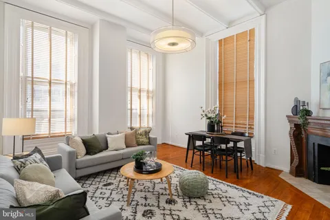 a close view of a utility room with dryer and washer