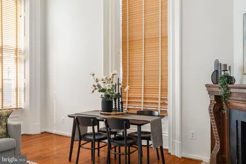 a view of storage and utility room with racks on the wall