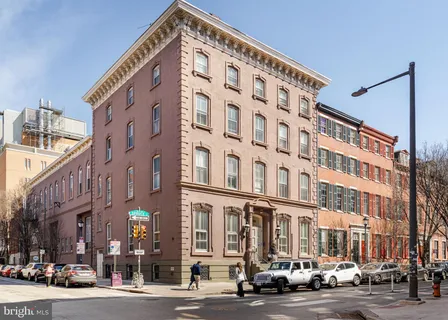 a view of a building with a street