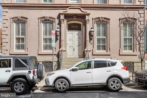 a car parked in front of a house