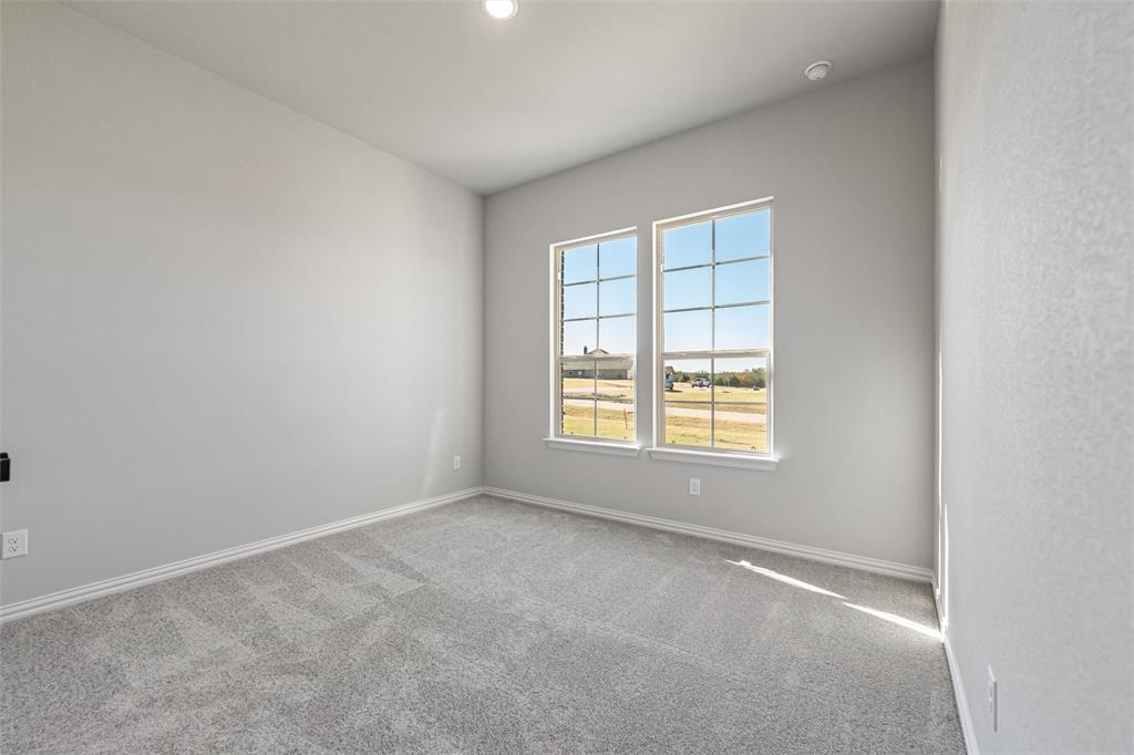 140 Oak Grv Way Springtown, TX 76082 - Photo 16 of 40 an empty room with a window