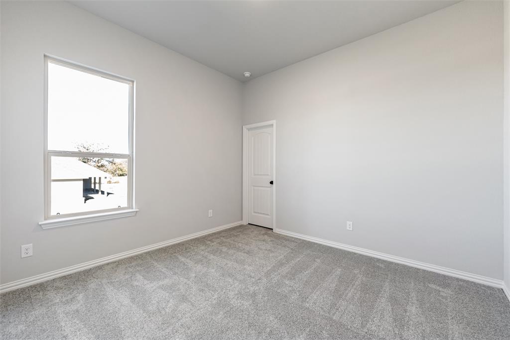 140 Oak Grv Way Springtown, TX 76082 - Photo 20 of 40 an empty room with a window
