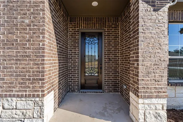 a front view of a house with a door