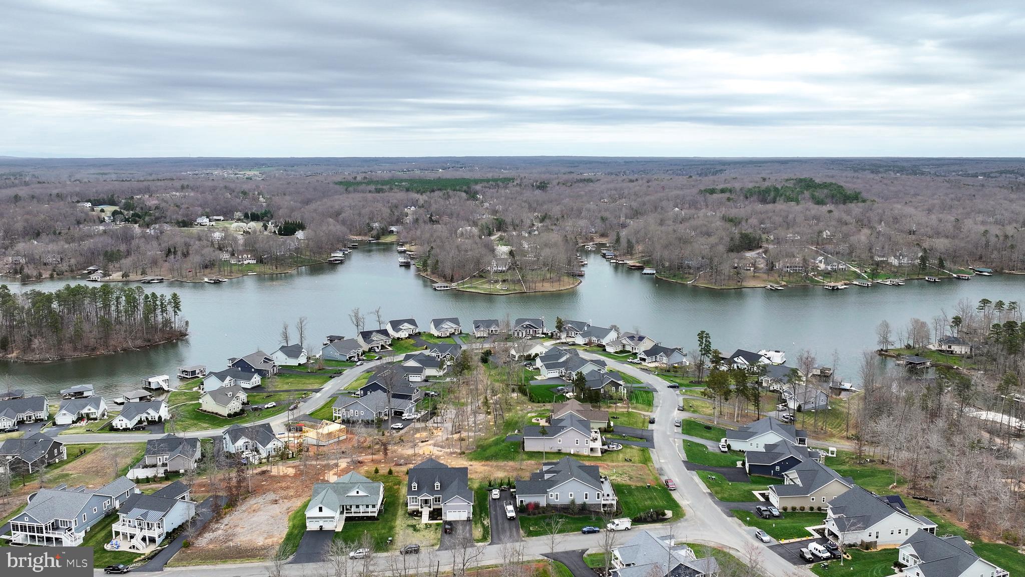 287 Sunset Loop Mineral, VA 23117 - Photo 66 of 112 an aerial view of a city with lots of residential buildings lake and ocean view