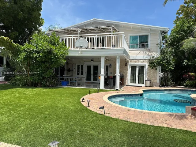 a view of a house with a swimming pool