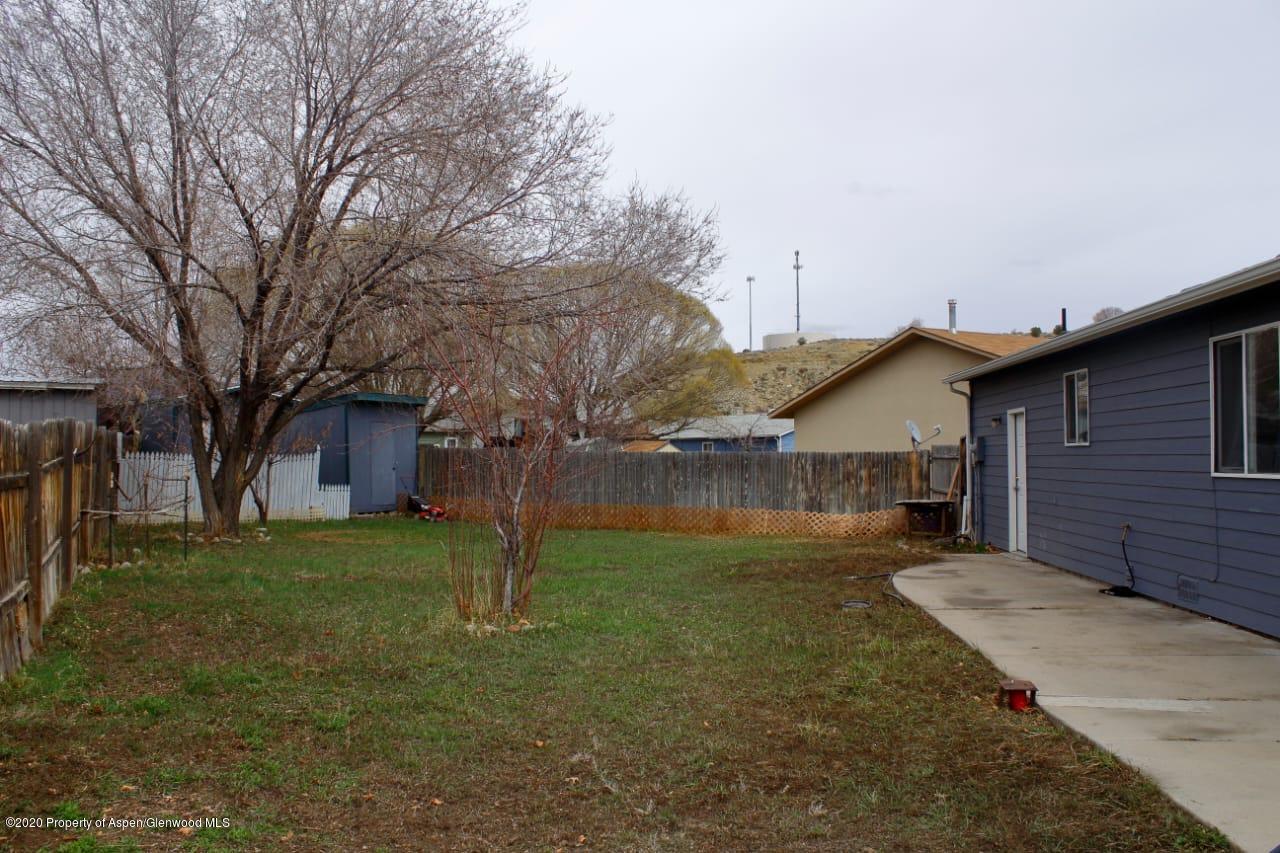 a view of backyard of house