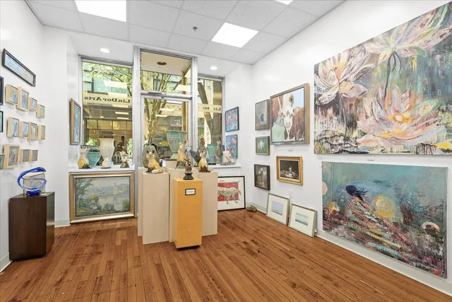 a kitchen with a stove a sink and a refrigerator