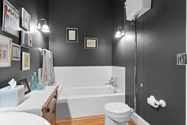 a bedroom with a bed and a table in it