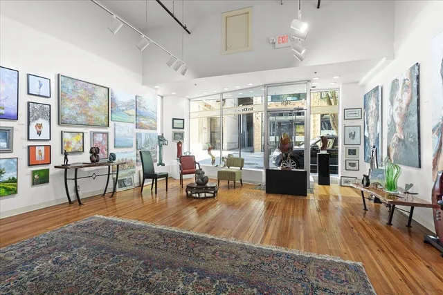 a stove top oven sitting inside of a kitchen