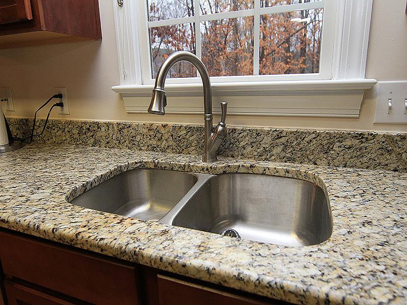 2937 Sunnystone Way Raleigh, NC 27613 - Photo 12 of 25 Enjoy the under mounted sink, Granite Counters and the view of the yard! Kitchen Sink