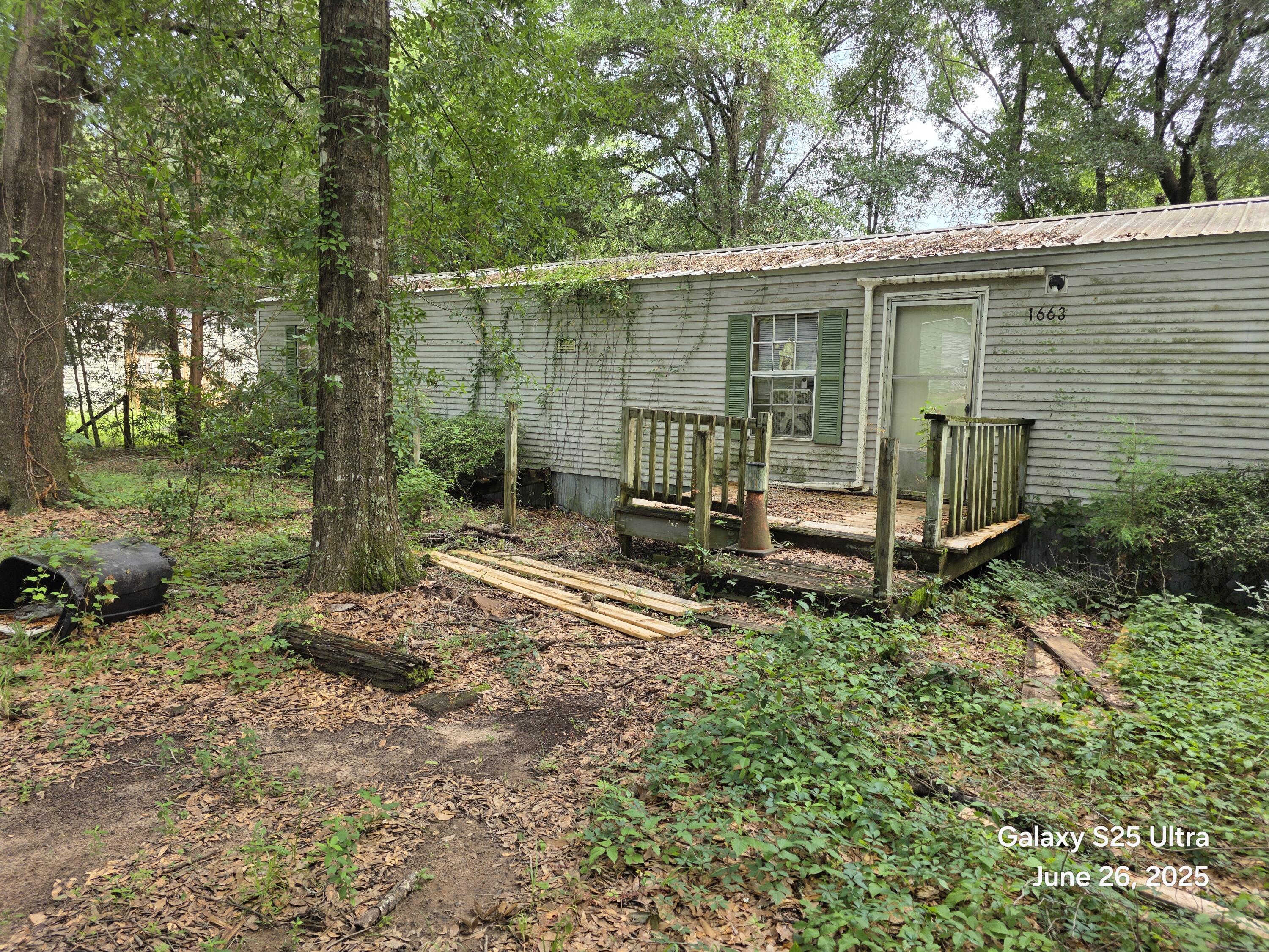 1663 Pickens Circle Baker, FL 32531 - Photo 4 of 9 20250626_101438