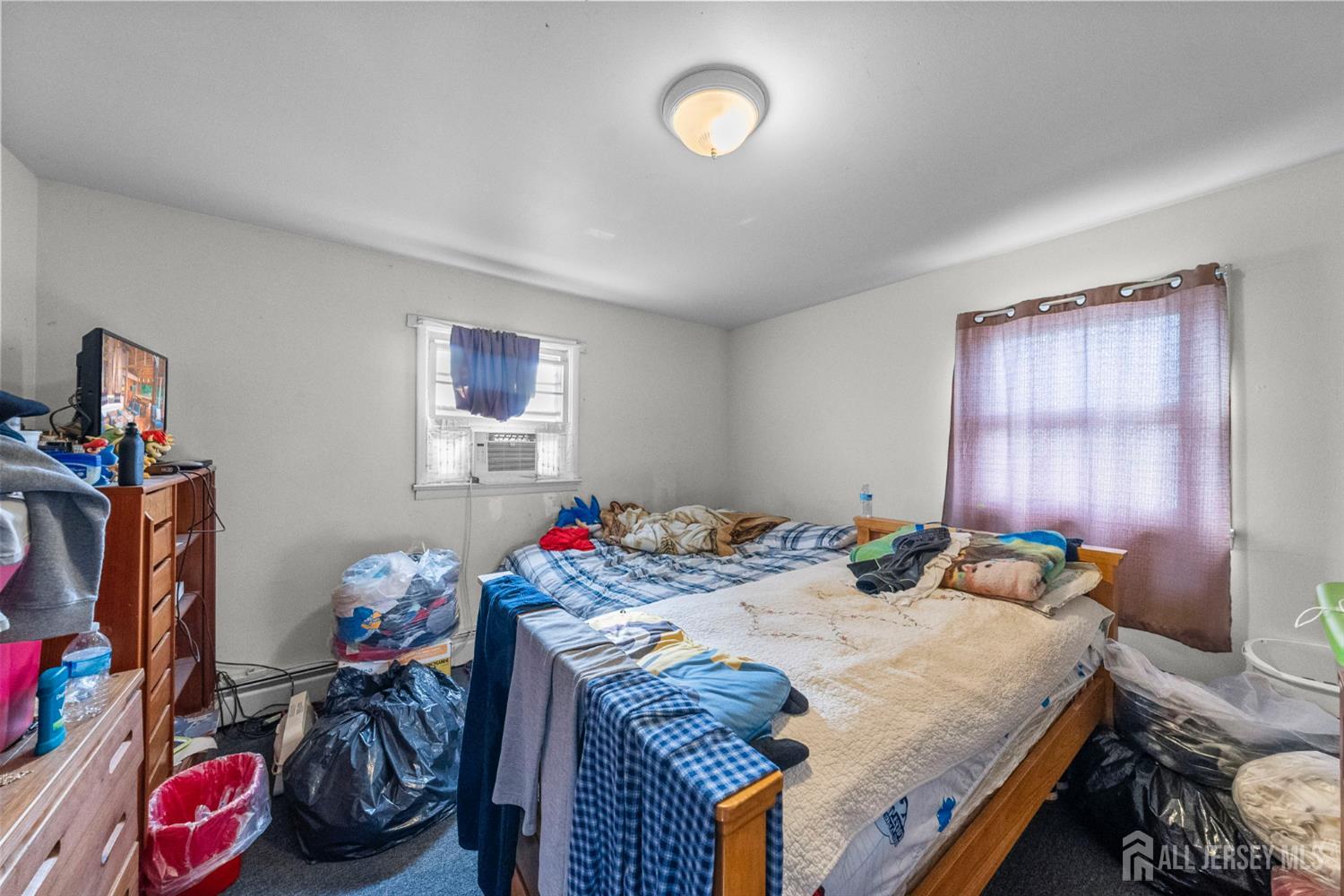 55 Frank Street Somerset, NJ 08873 - Photo 12 of 33 a bedroom with bed and a window