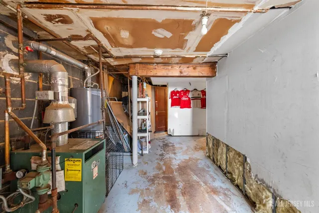 a bed room with furniture and a flat screen tv