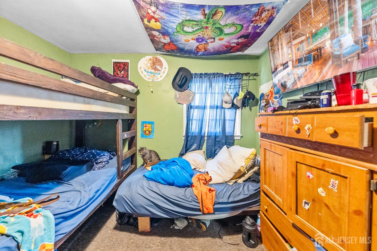 55 Frank Street Somerset, NJ 08873 - Photo 25 of 33 a room with furniture and a chandelier