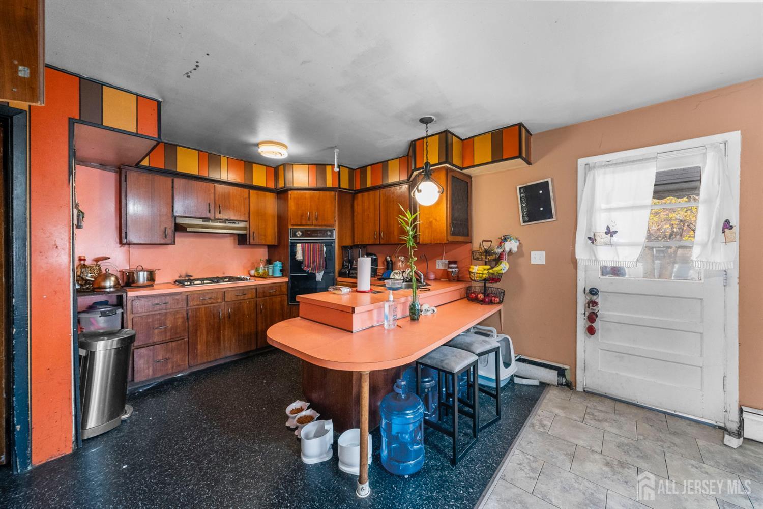 55 Frank Street Somerset, NJ 08873 - Photo 27 of 33 a large kitchen with a table and chairs