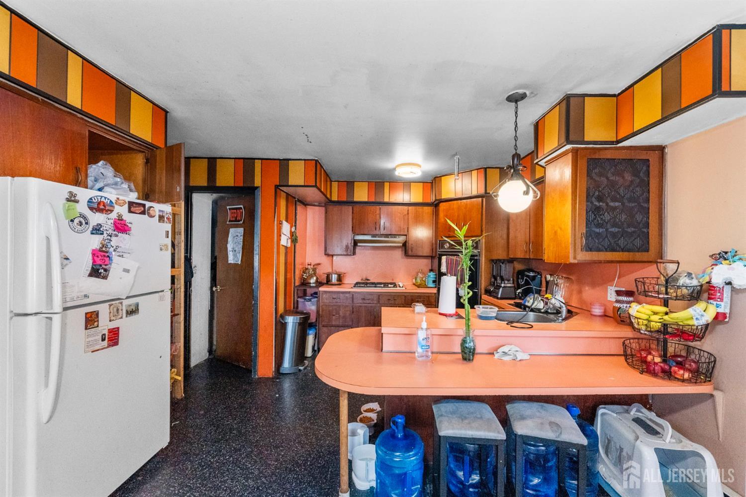 55 Frank Street Somerset, NJ 08873 - Photo 28 of 33 a view of a dining room with furniture and a chandelier