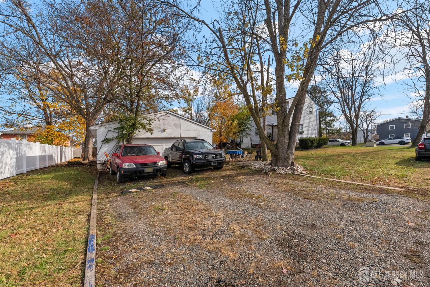 55 Frank Street Somerset, NJ 08873 - Photo 33 of 33 a view of a yard with a car parked in front of it