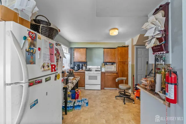 a living room with furniture gym equipment and a large window