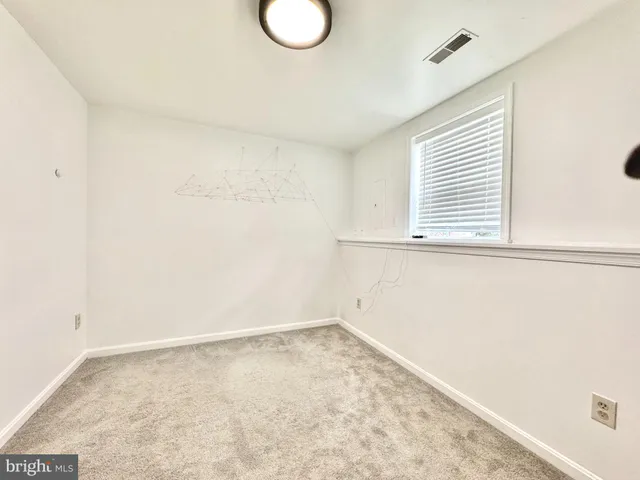 a view of workspace with a couch