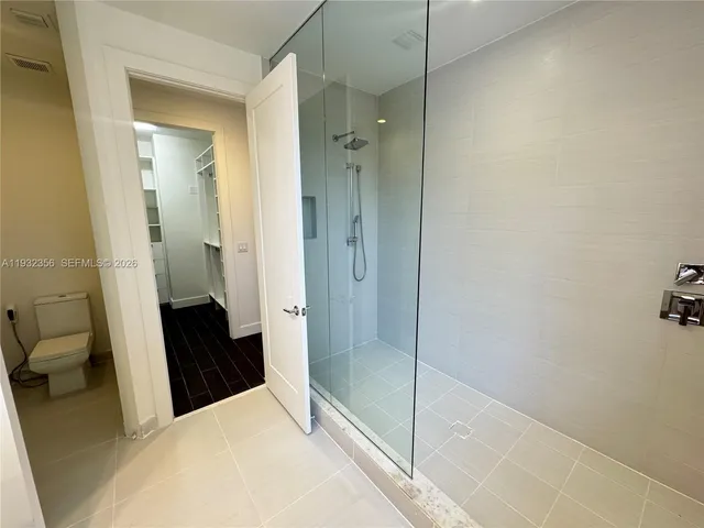 a bathroom with a bathtub and a sink