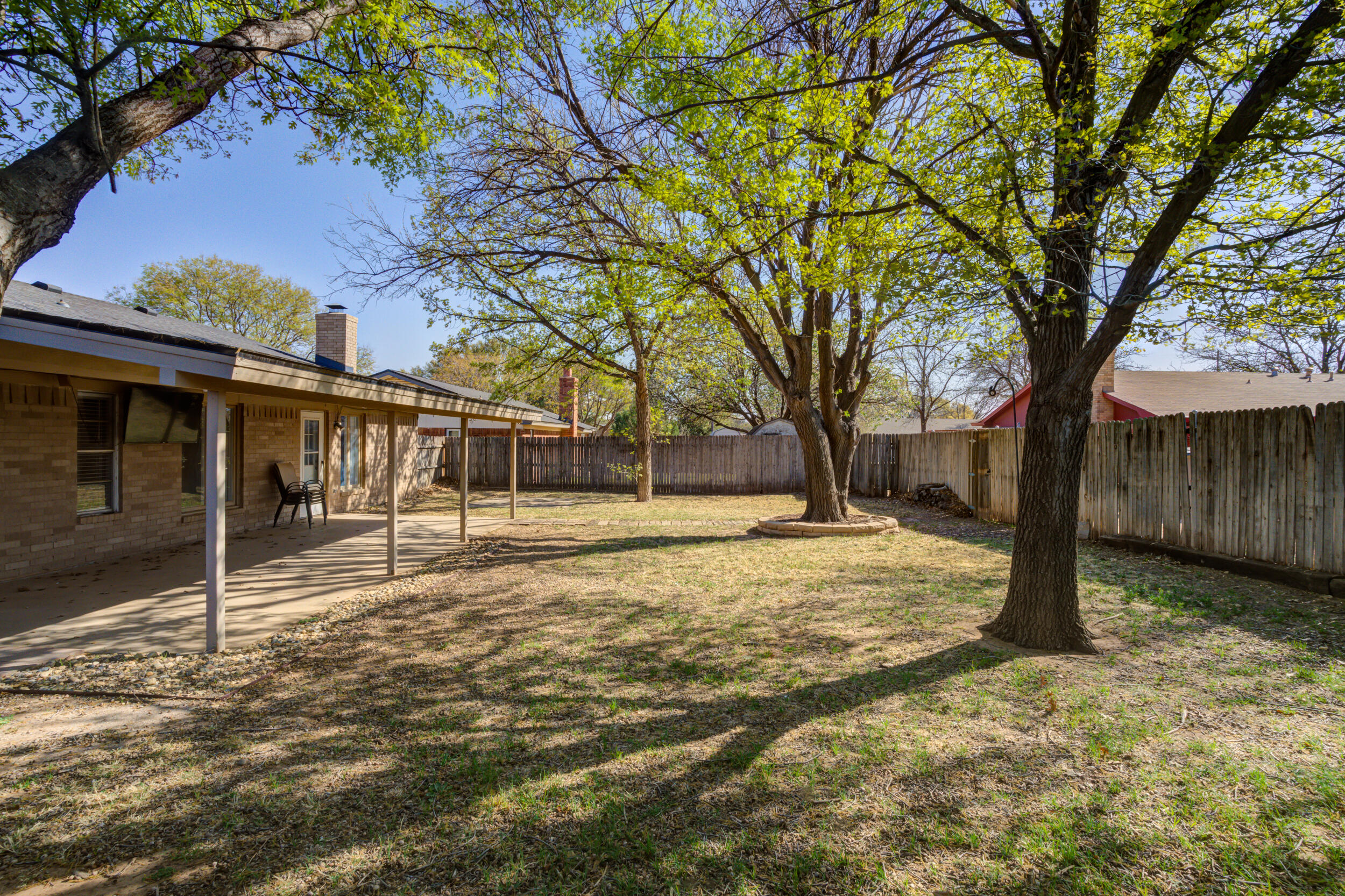 7106 Zoar Avenue Lubbock, TX 79424 - Photo 32 of 33 a view of a house with a yard