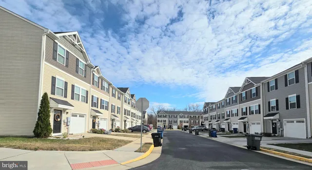 a city street lined with tall buildings