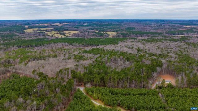 a view of a lake with a yard