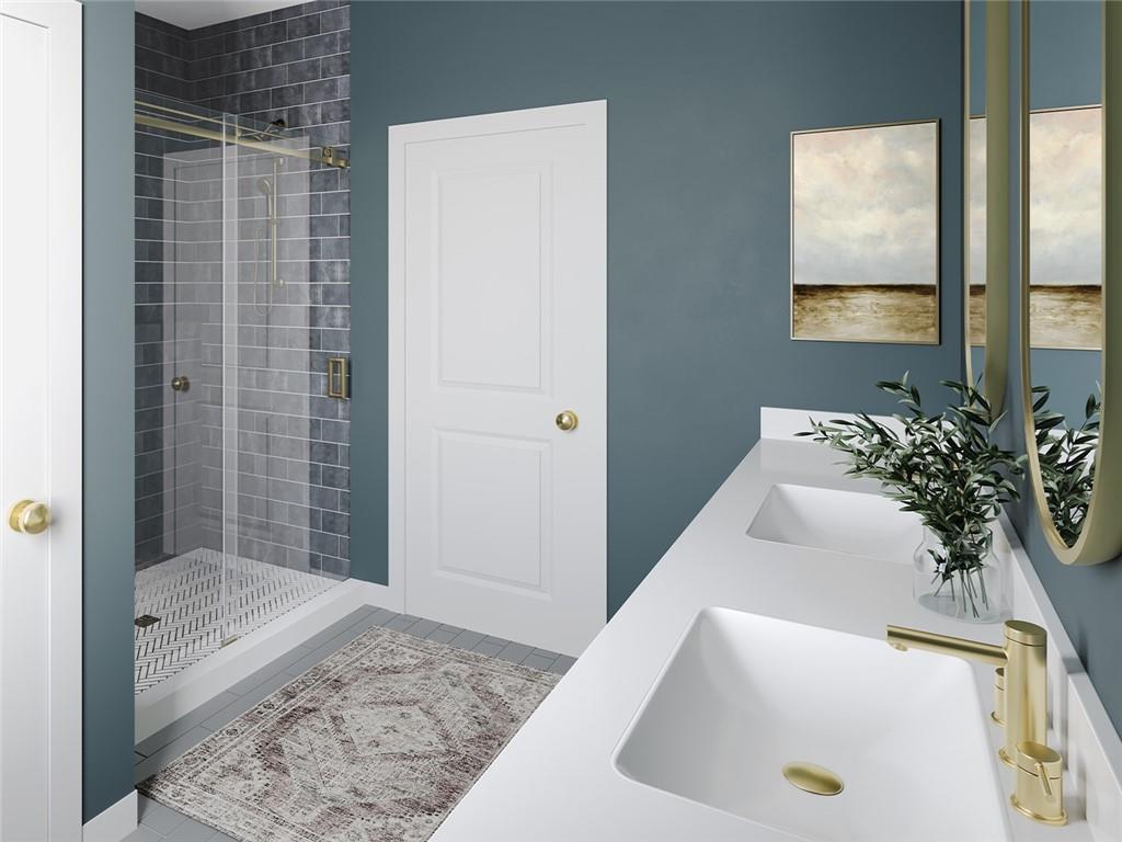 102 Ramsgate Road, Unit ARUNDEL Cranberry Township, PA 16066 - Photo 13 of 27 a bathroom with a tub and shower