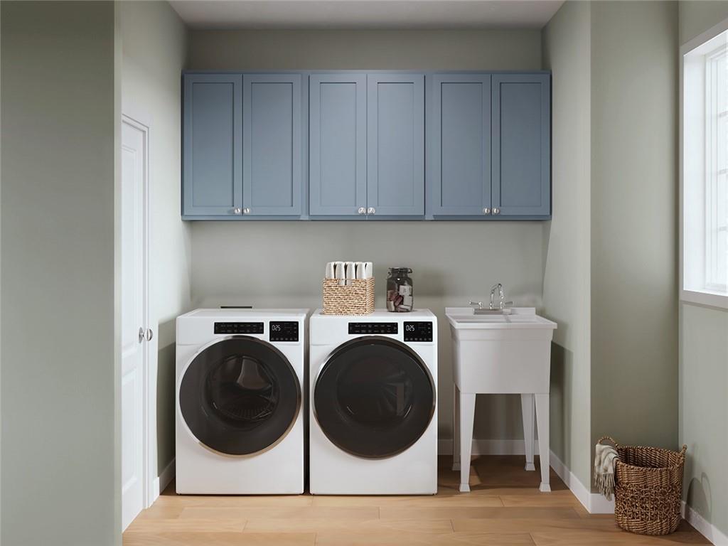 102 Ramsgate Road, Unit ARUNDEL Cranberry Township, PA 16066 - Photo 8 of 27 a view of a room with washer and dryer