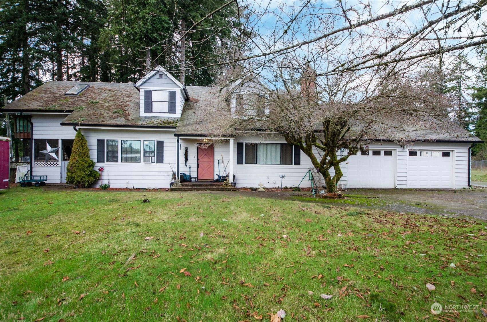 10430 Highway 12 Rochester, WA 98579 - Photo 1 of 36 a front view of a house with a yard