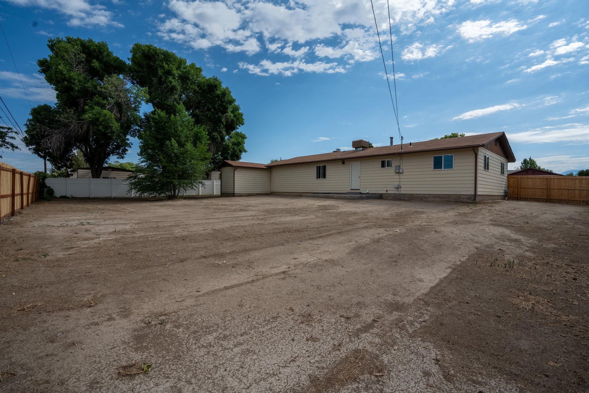 543 Dodge Street Grand Junction, CO 81504 - Photo 15 of 19 a view of a house with a backyard