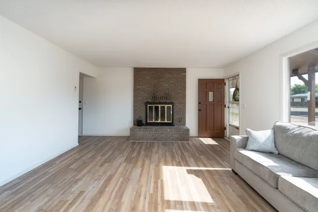 a view of livingroom with furniture and wooden floor