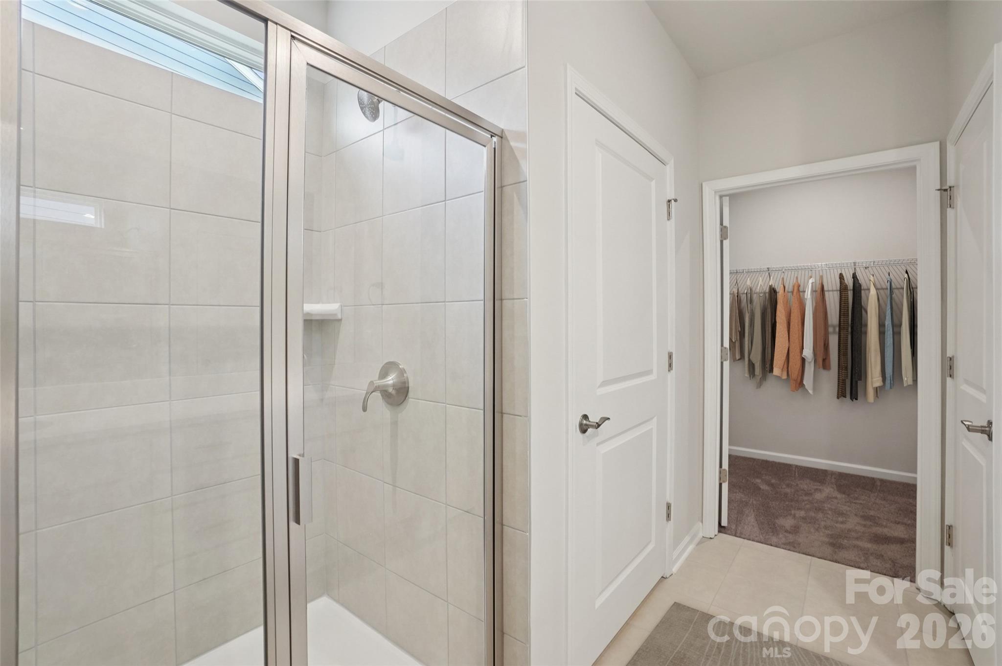 1044 Arundle Road Catawba, NC 28609 - Photo 11 of 39 a bathroom with a shower and a glass door
