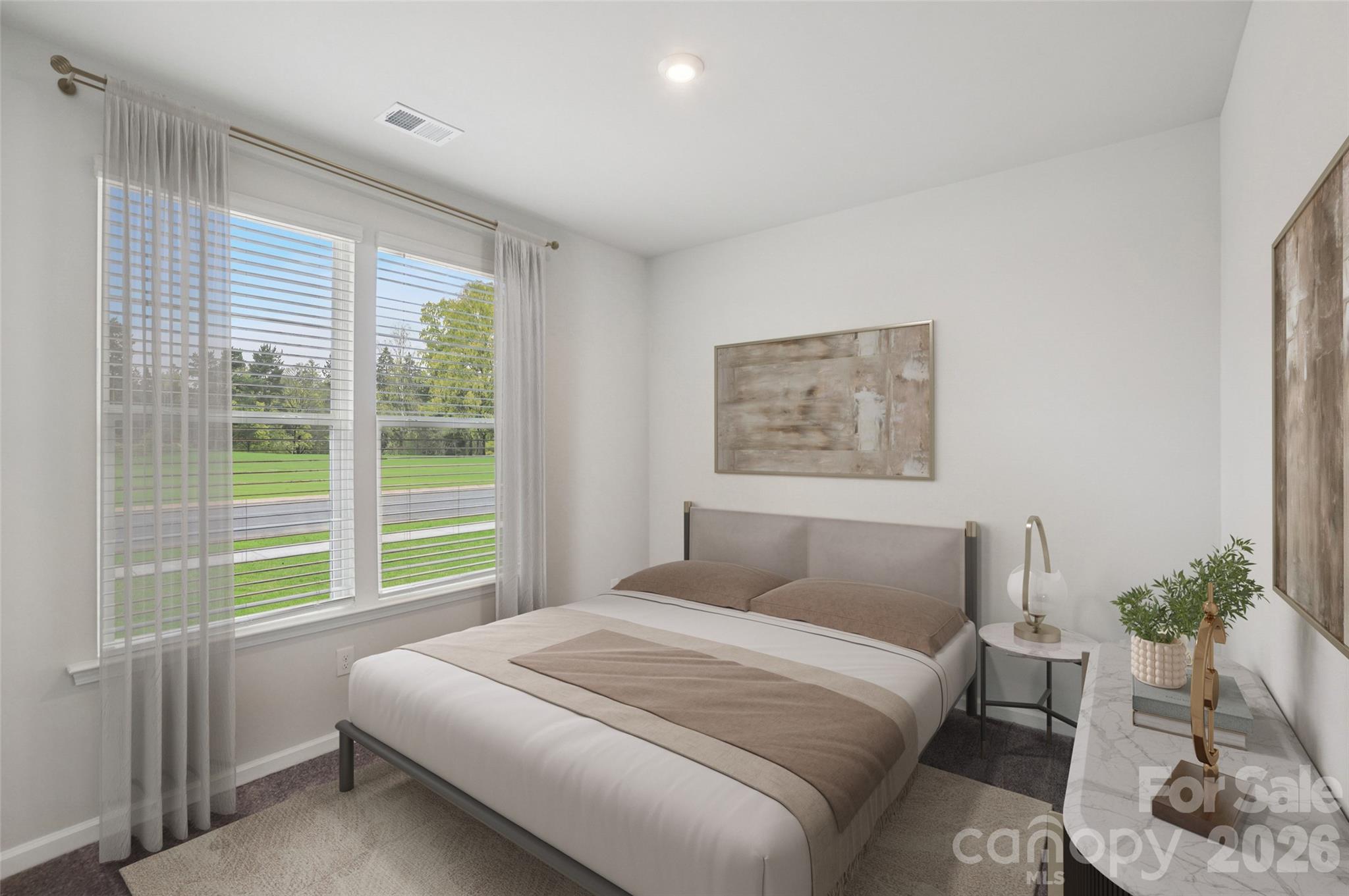 1044 Arundle Road Catawba, NC 28609 - Photo 18 of 39 a bedroom with a large bed and a window