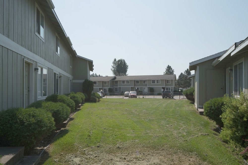 1701 West 7th Street Newport, WA 99156 - Photo 4 of 8 a view of a garden with plants and seating area