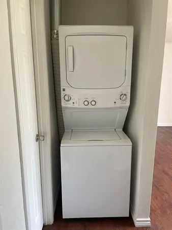 a utility room with dryer and washer