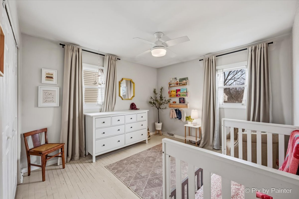 152 Walnut Drive St. Charles, IL 60174 - Photo 17 of 30 a view of a bedroom with furniture and windows