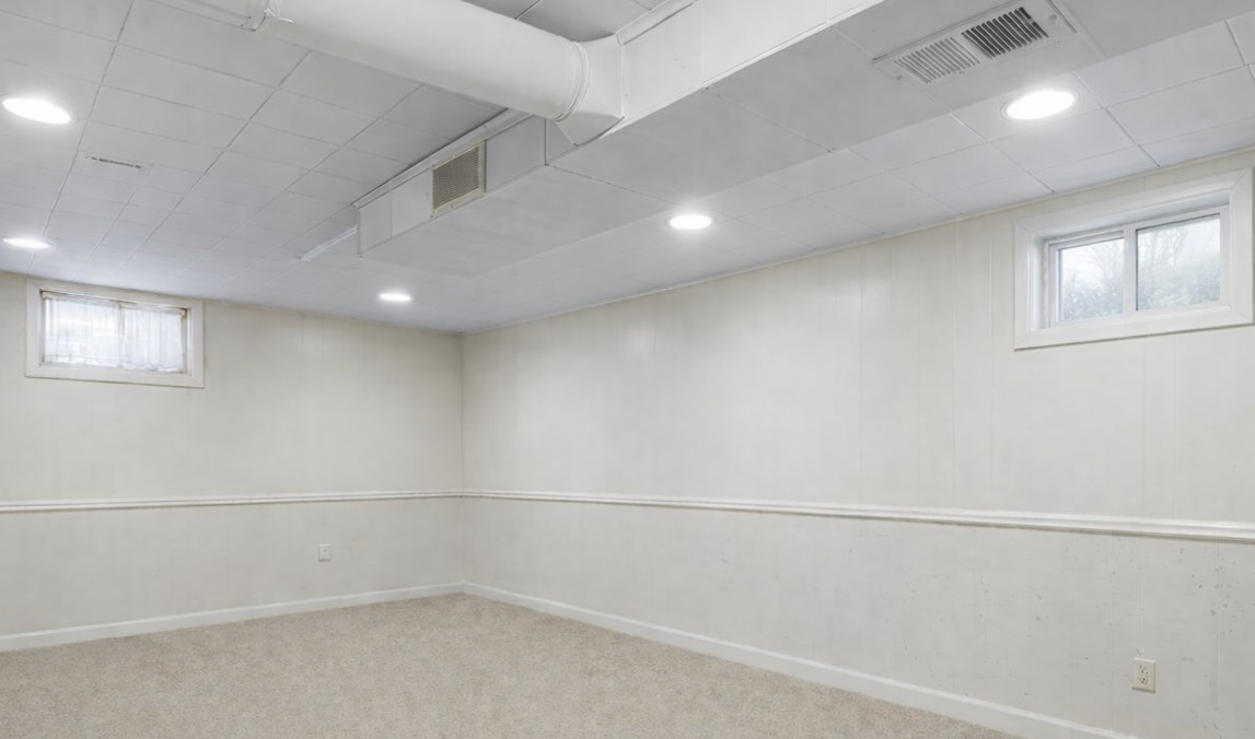 152 Walnut Drive St. Charles, IL 60174 - Photo 24 of 30 a view of a room with racks on the wall