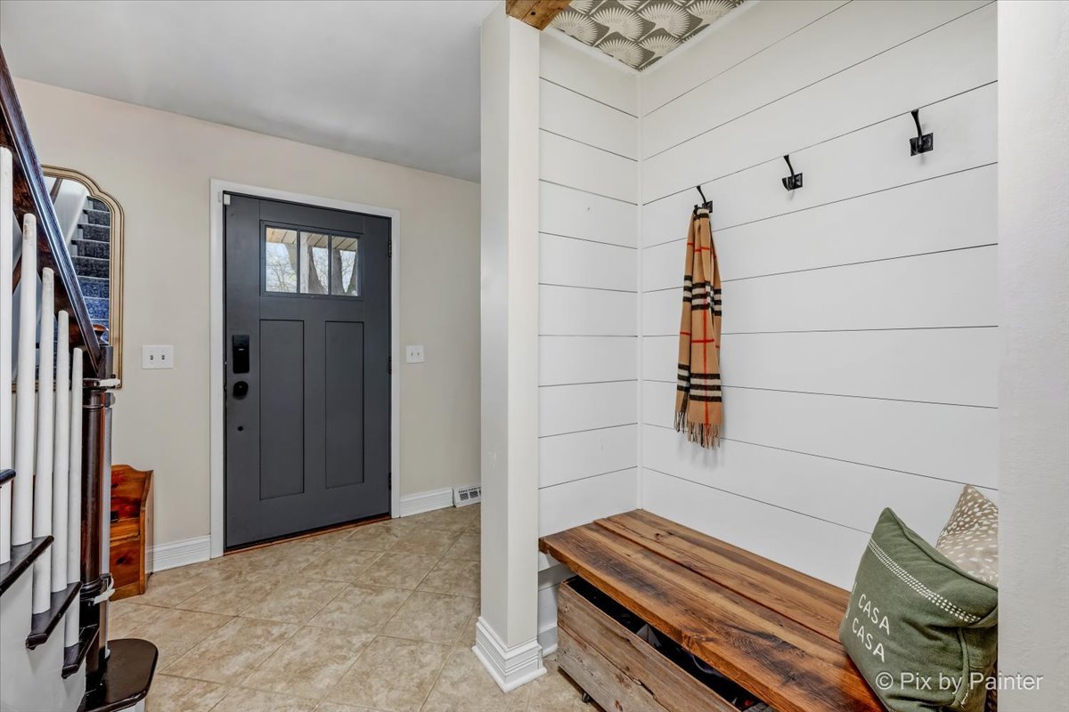 152 Walnut Drive St. Charles, IL 60174 - Photo 4 of 30 a view of a hardwood floor and wardrobe