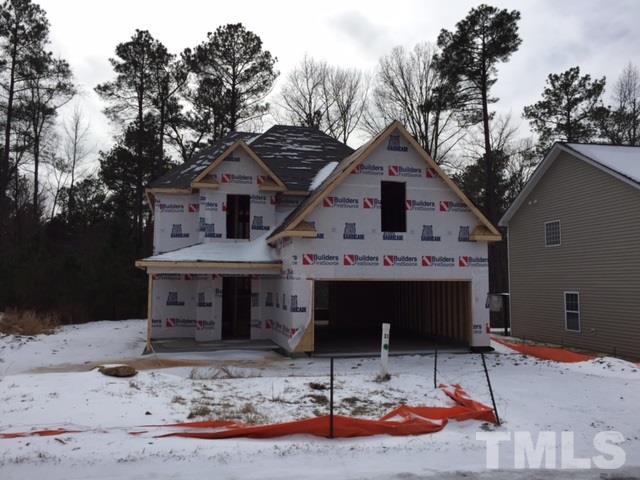 3908 Mike Levi Court Raleigh, NC 27610 - Photo 1 of 10 a front view of a house with garage