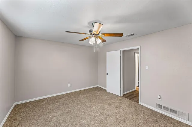 a bathroom with a toilet and a bathtub