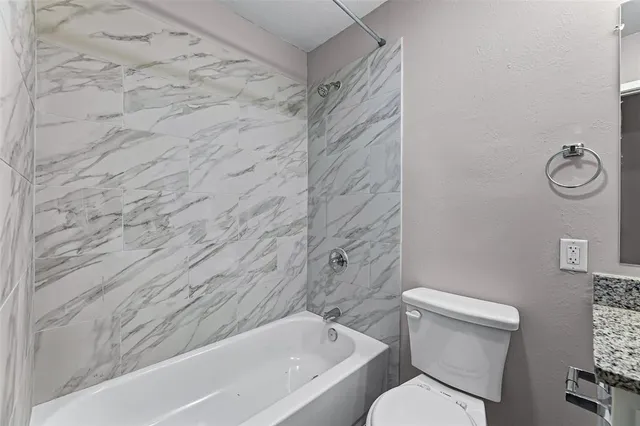 a picture of a wall with a white wall and a picture